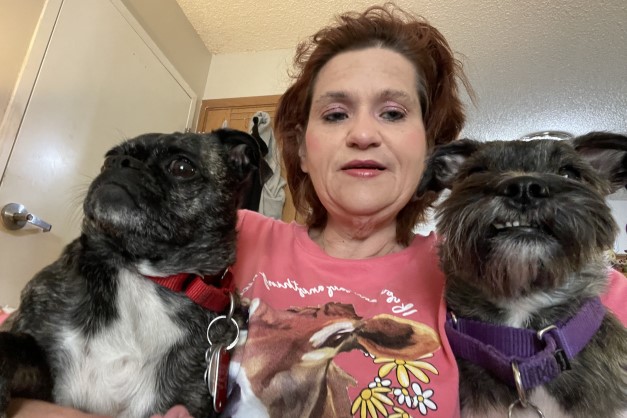 Patient with dogs after successful ankle surgery