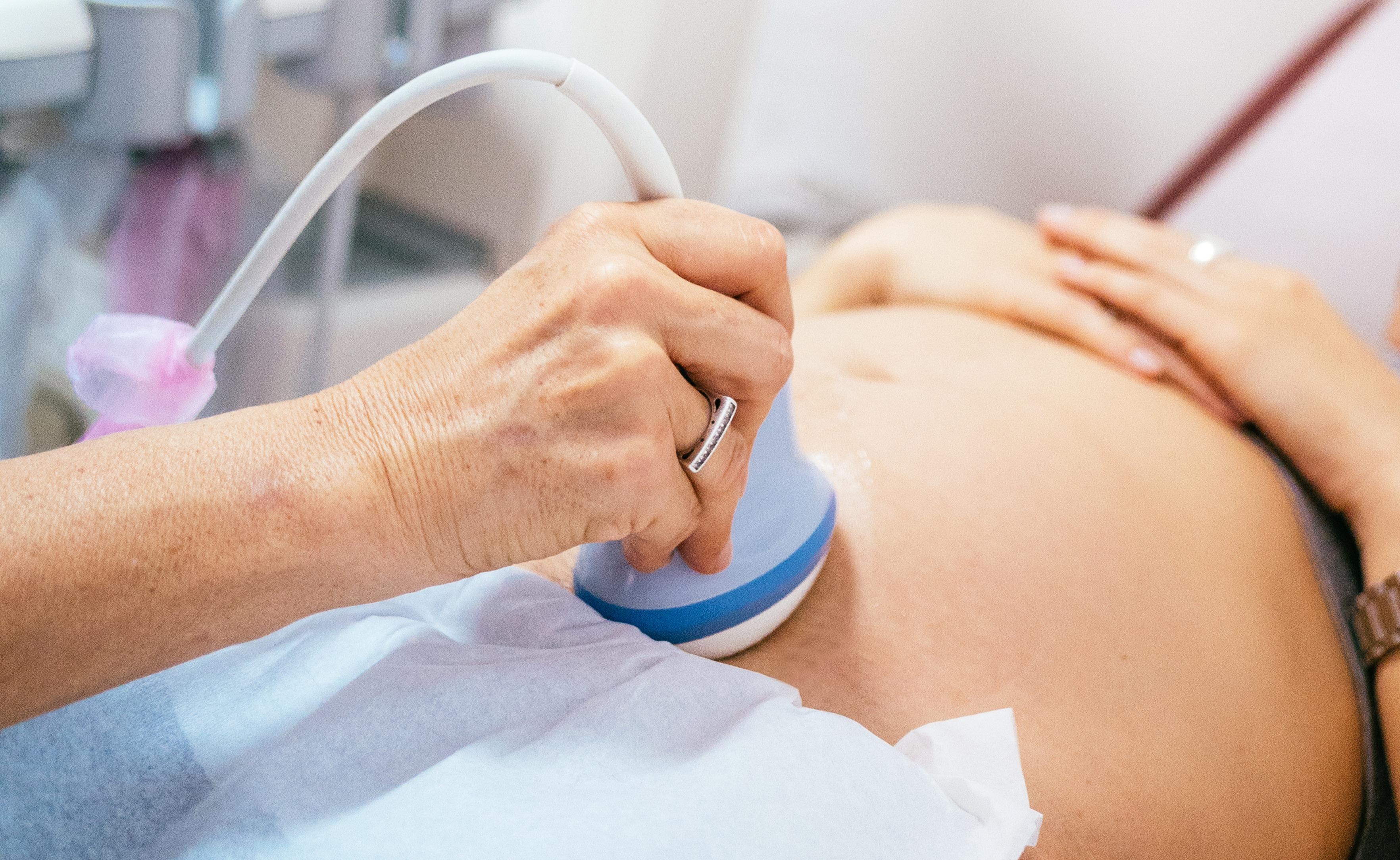 A woman getting an ultrasound.