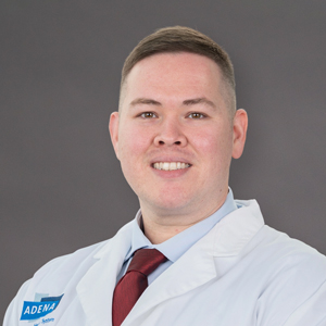 Dr. Kerry Bellew in his professional headshot.